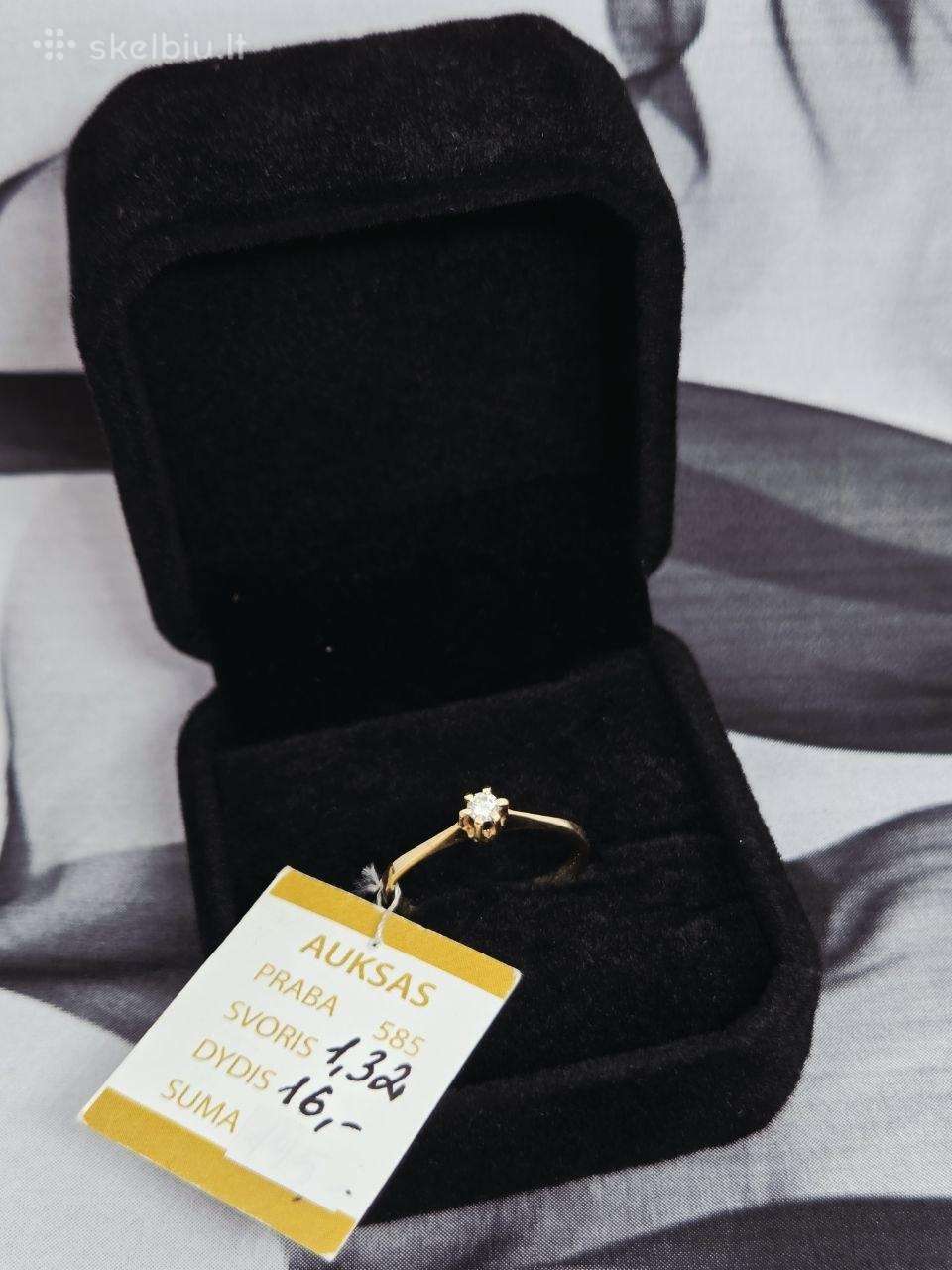 Auksinis žiedas su deimantu - 190 Eur.