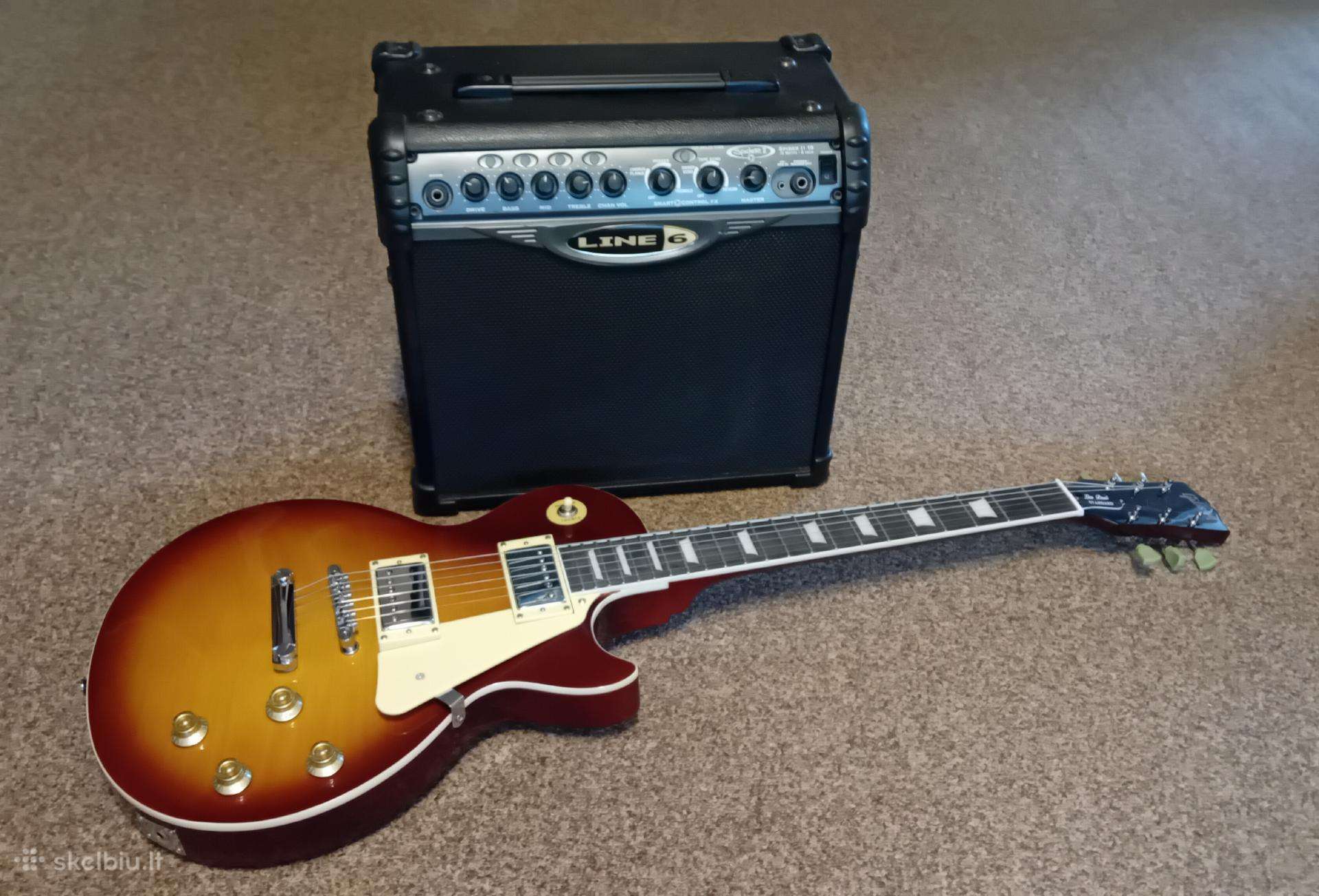 Elektrinė gitara su kubu