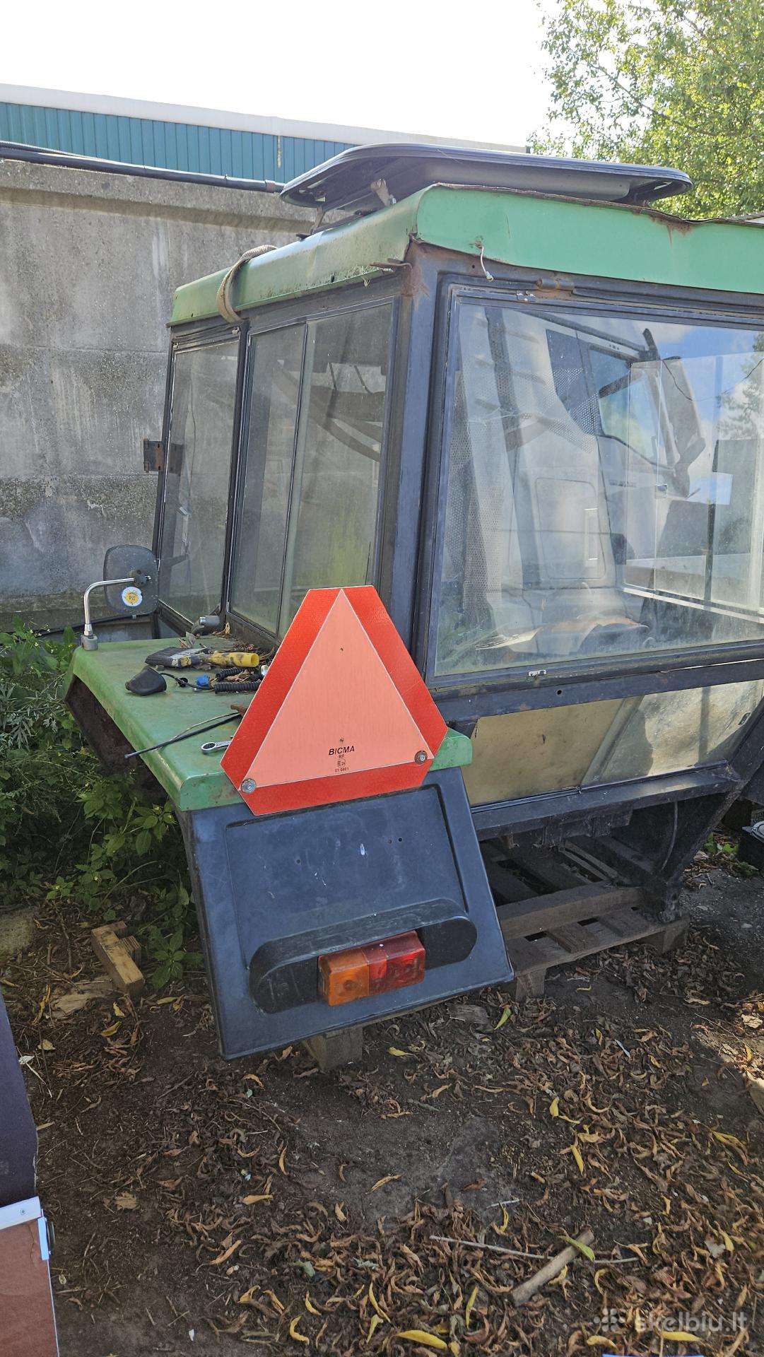 John Deere traktoriaus kabina