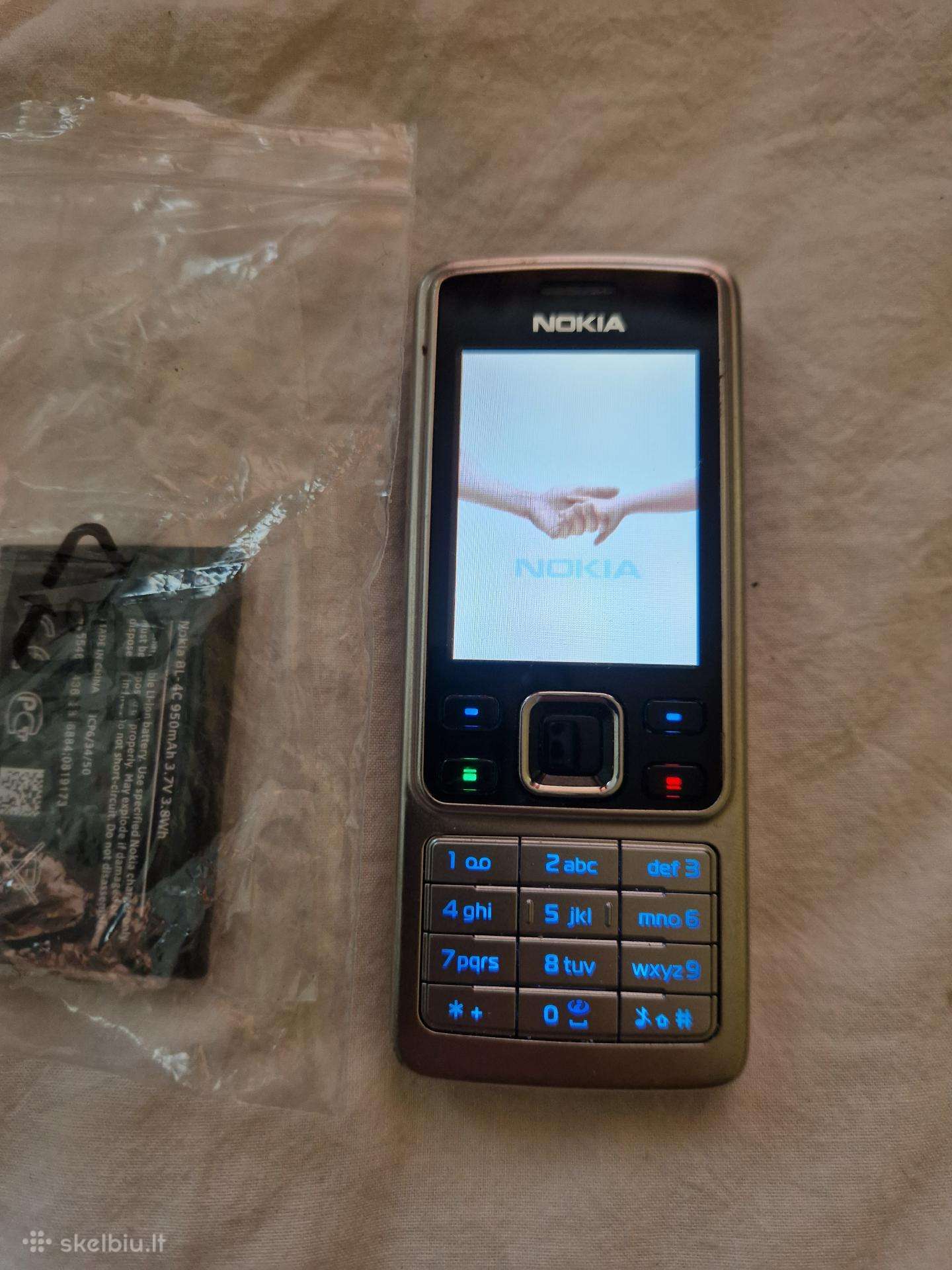 Nokia 6300 su nauja baterija tvarkingas