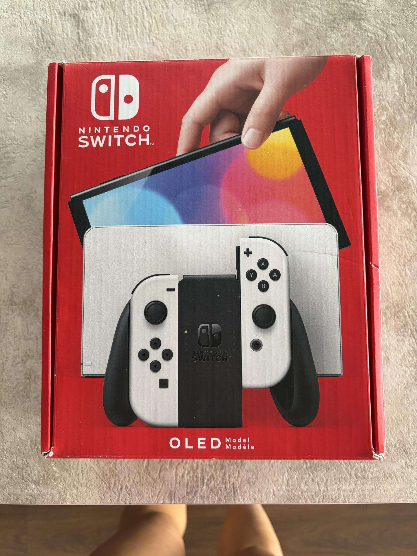 Nintendo Switch Oled baltas