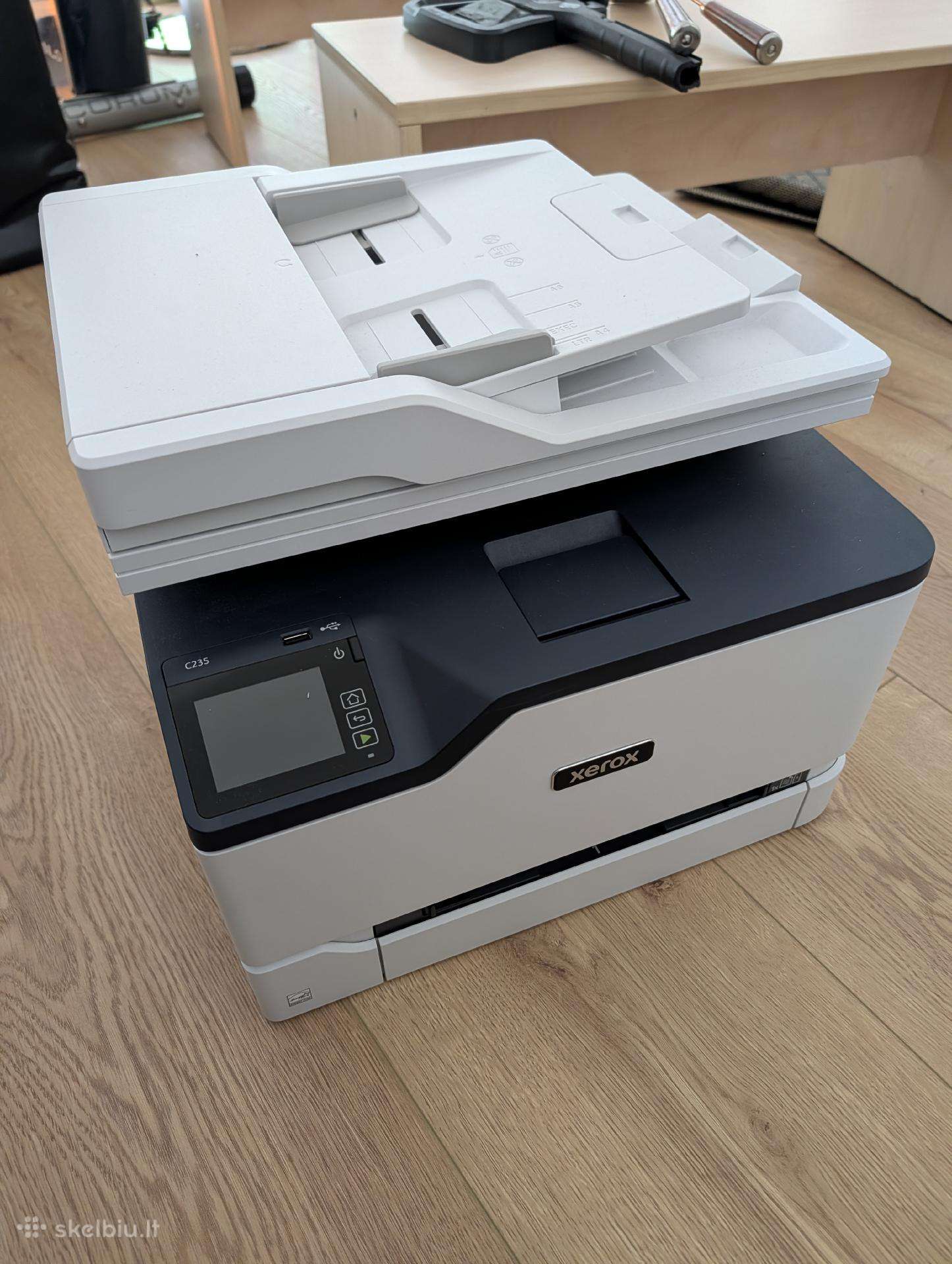 Xerox c235 printeris
