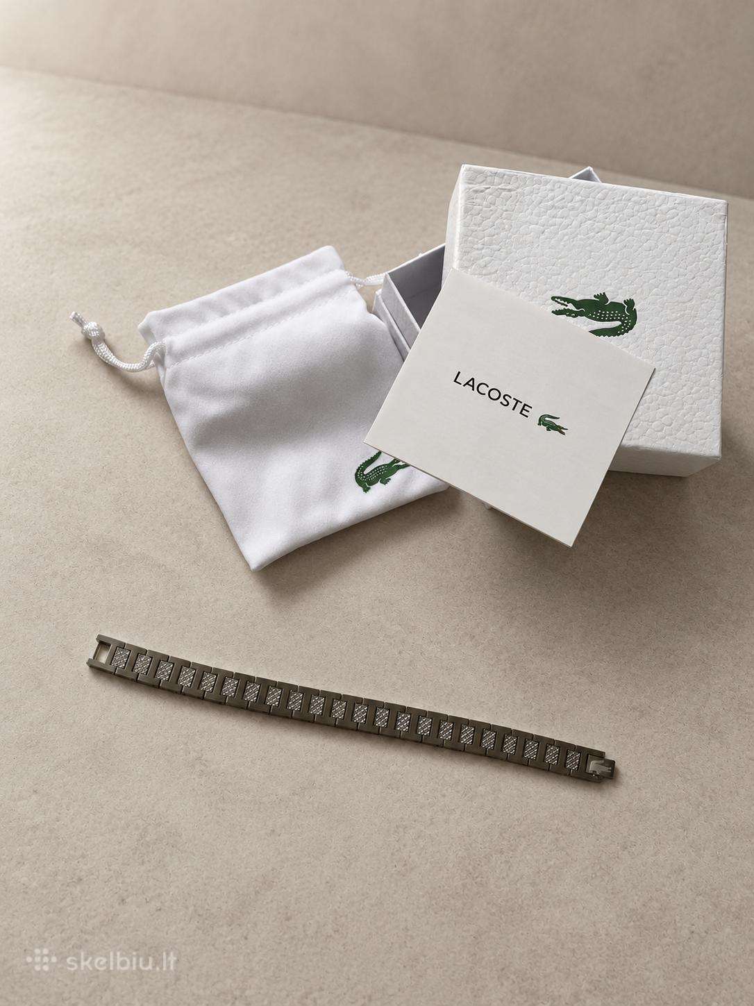 Lacoste metalinė apyrankė.