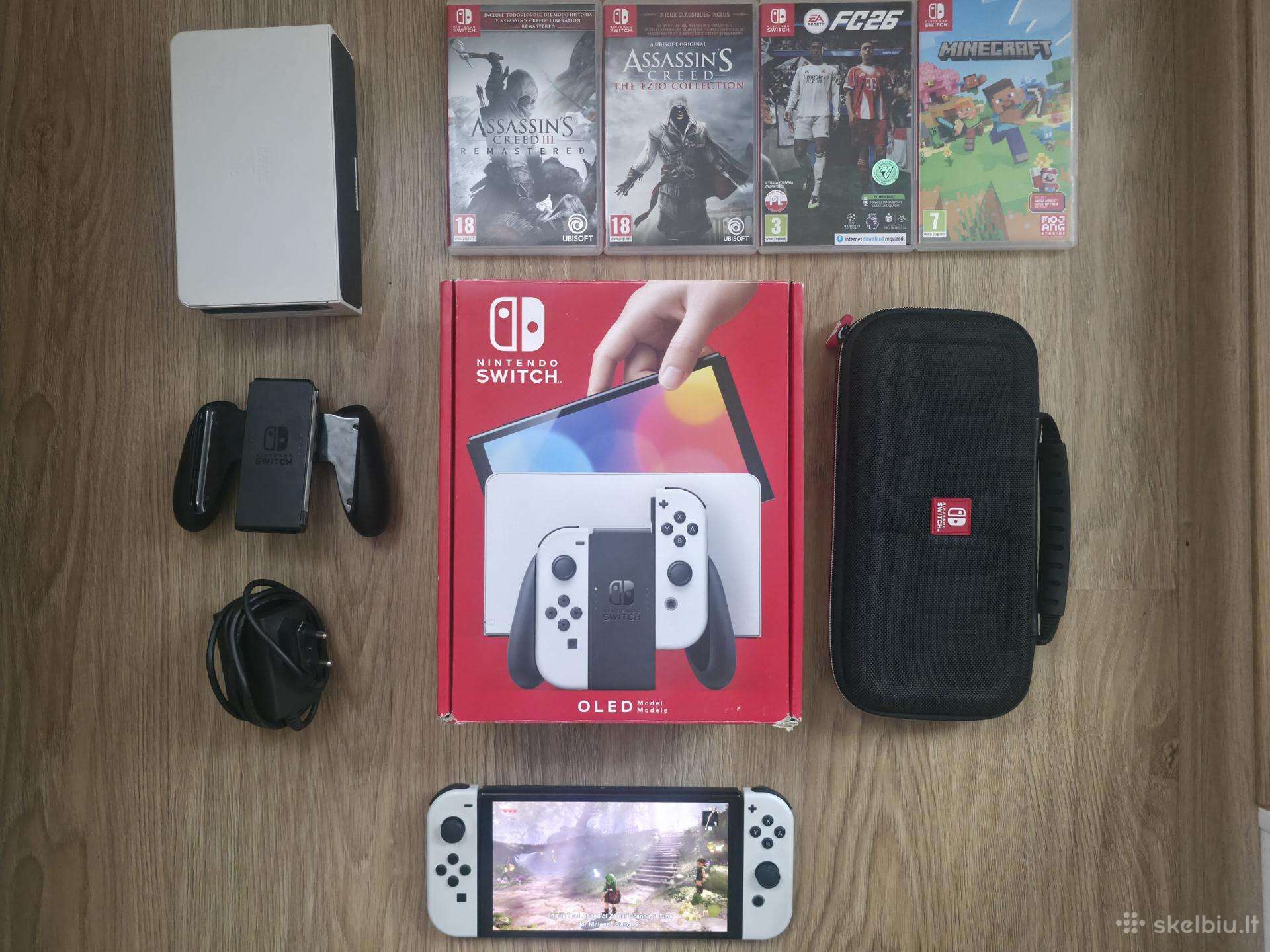 Nintendo Switch + 4 žaidimai ir priedai