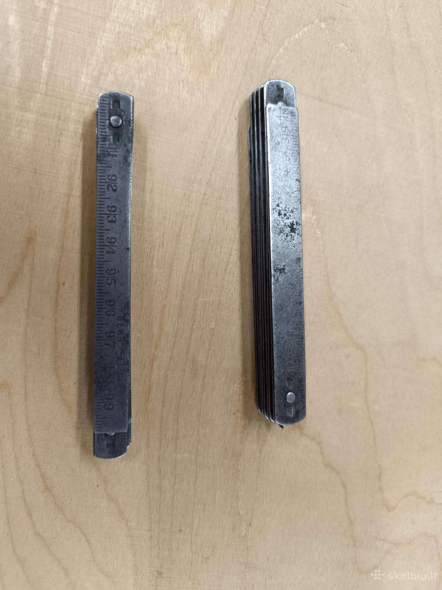 Senos metalinės sulankstomos 1 m liniuotės 2 vnt