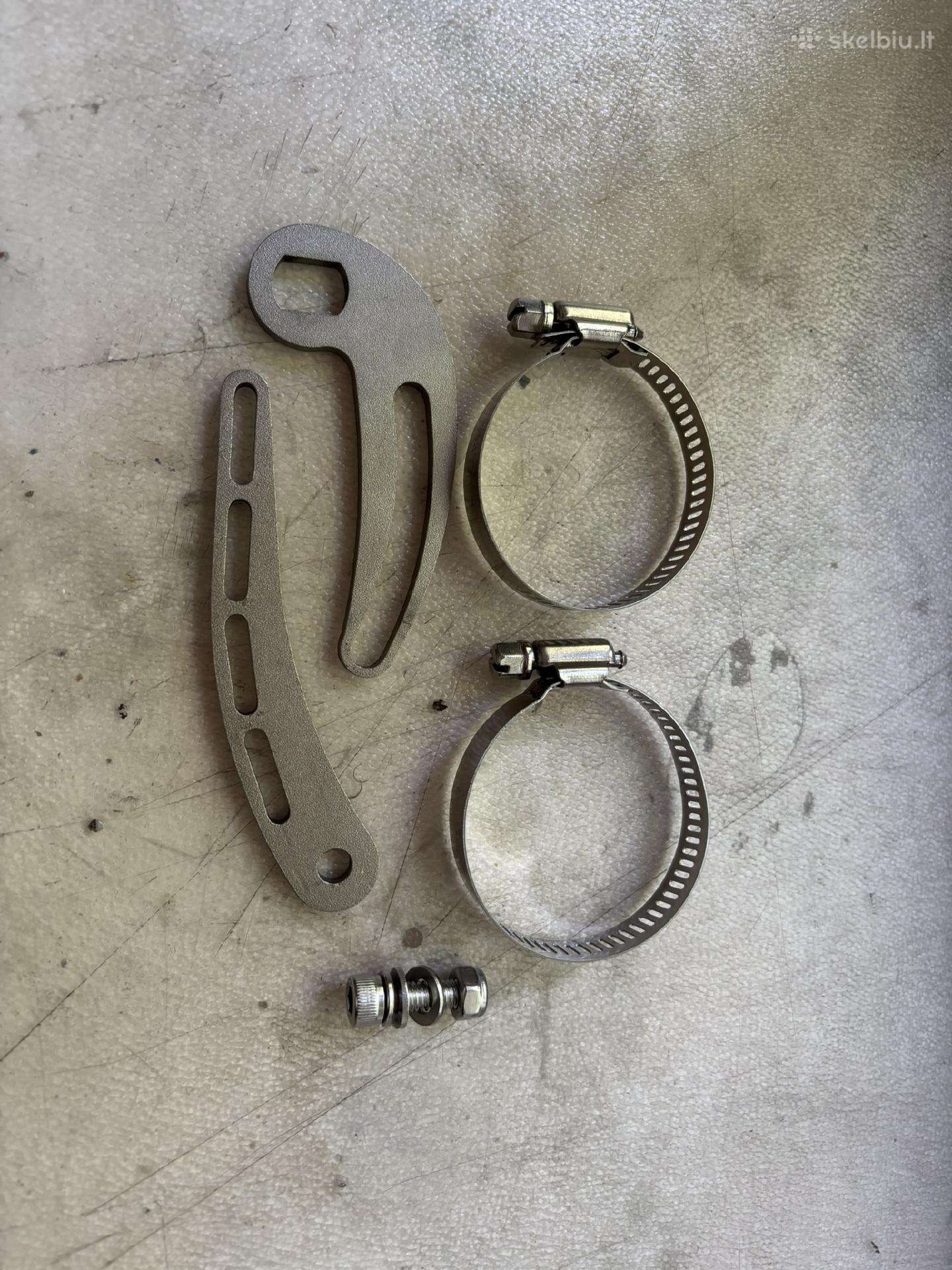 El. dviračio sukimo momento svirtis (Torque arm)