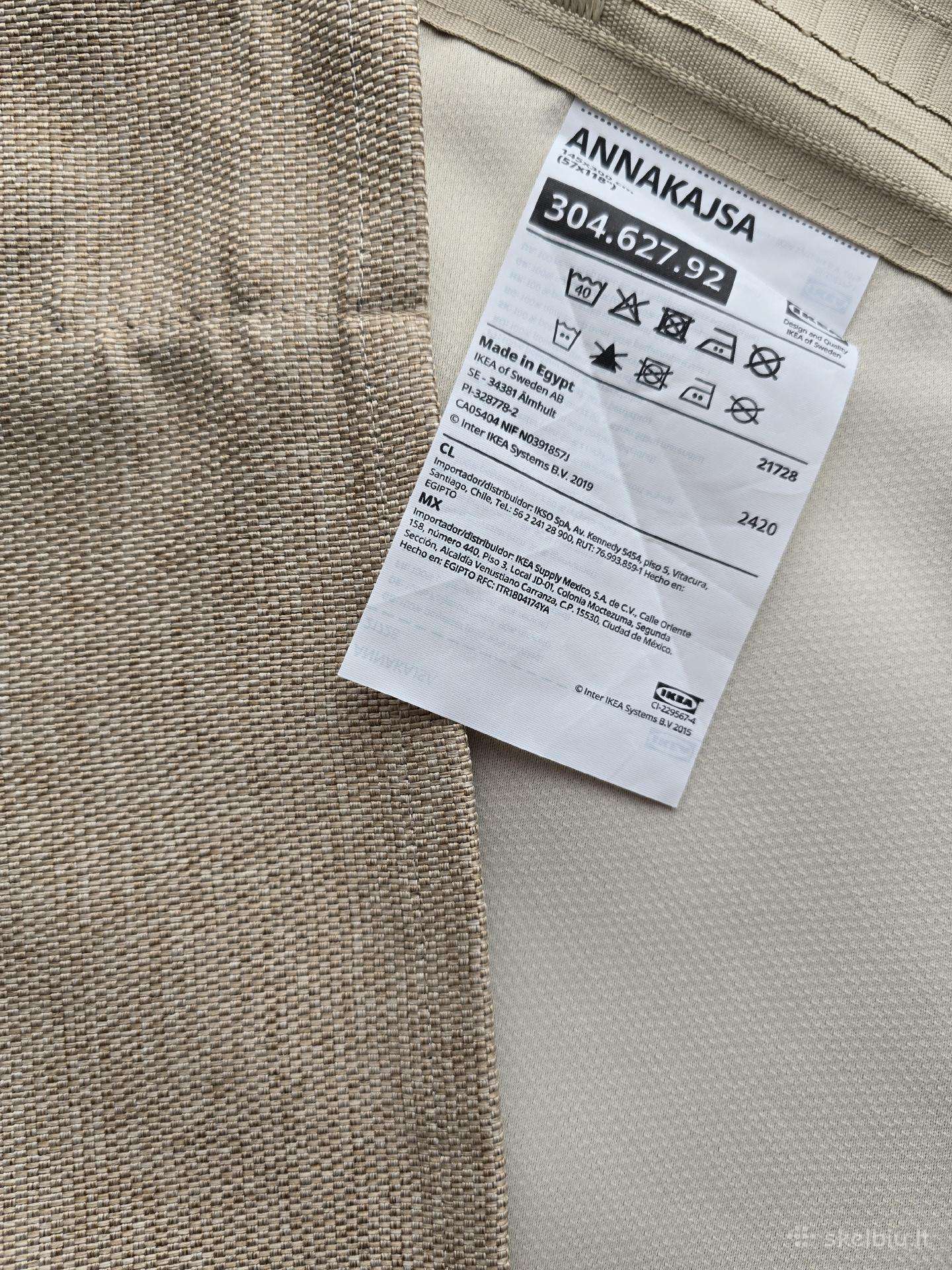 Temdančios smėlio spalvos užuolaidos (iš Ikea)