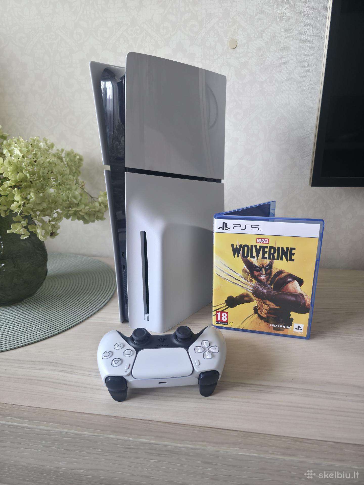 Ps5 diskine su Wolverine kompaktu
