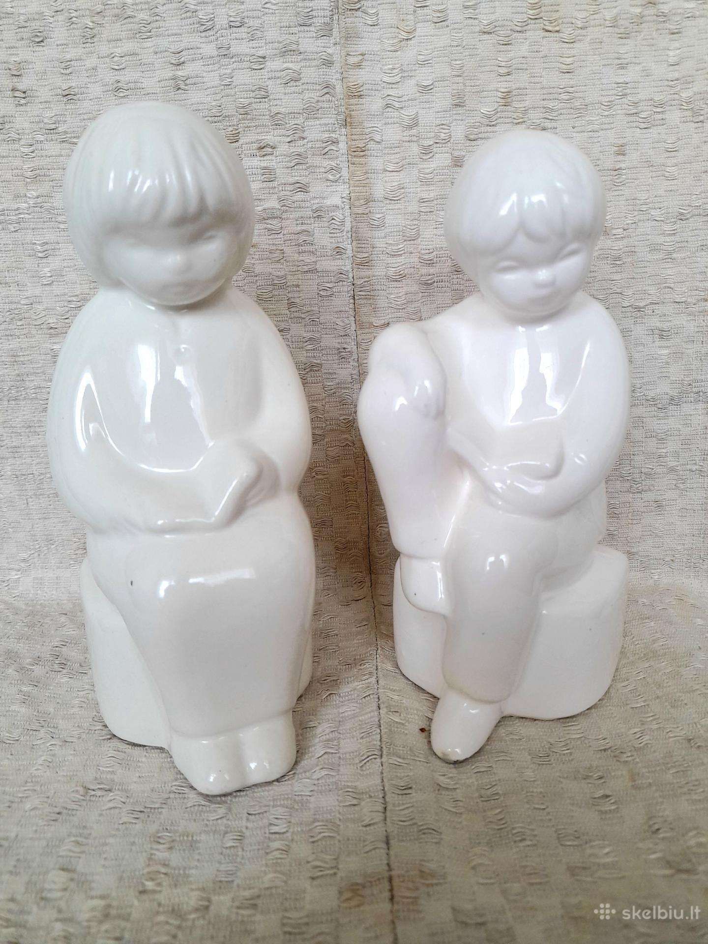 Porceliano statulėlės /knygų laikikliai/