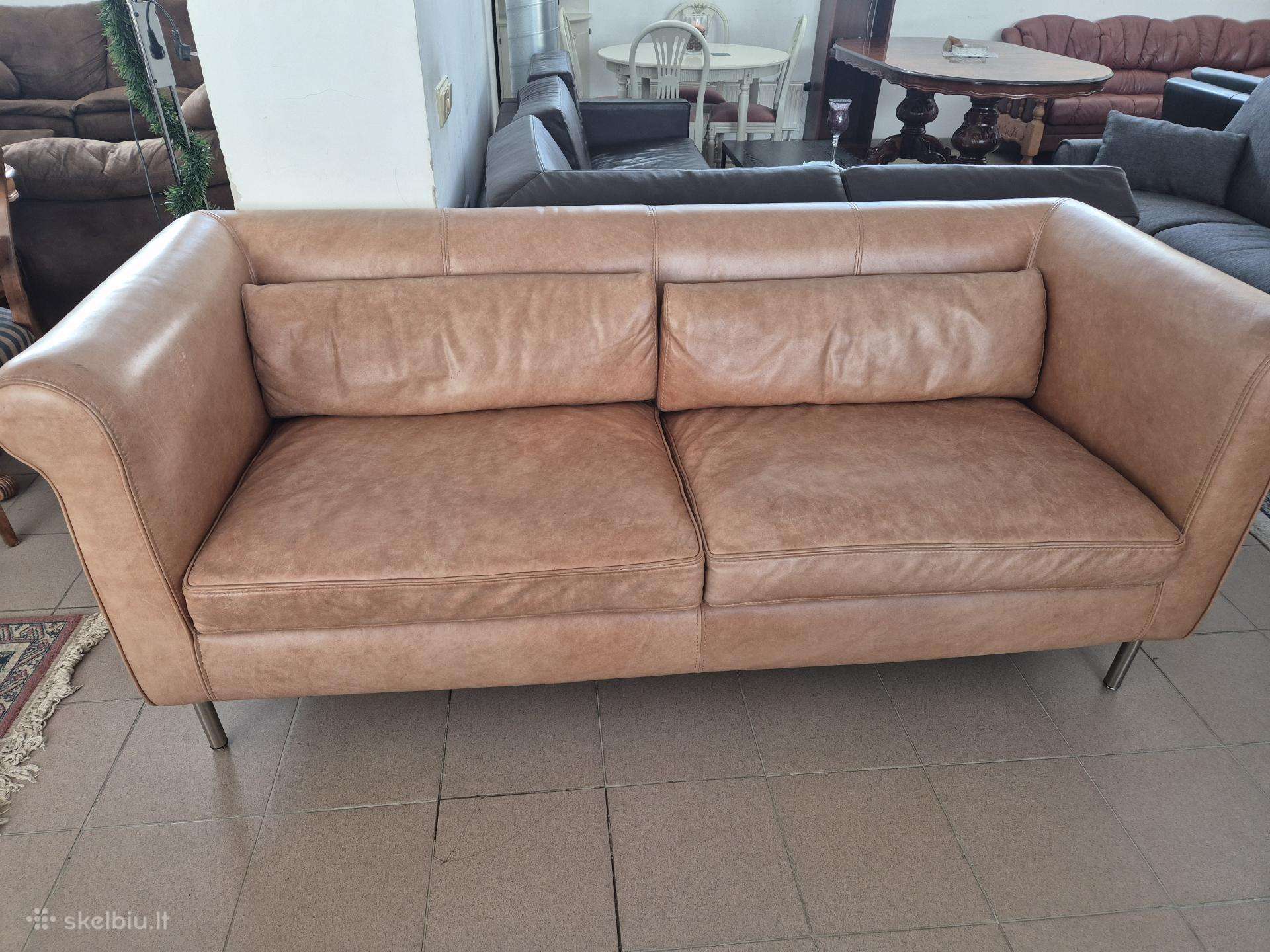Išskirtinė natūralios odos sofa.