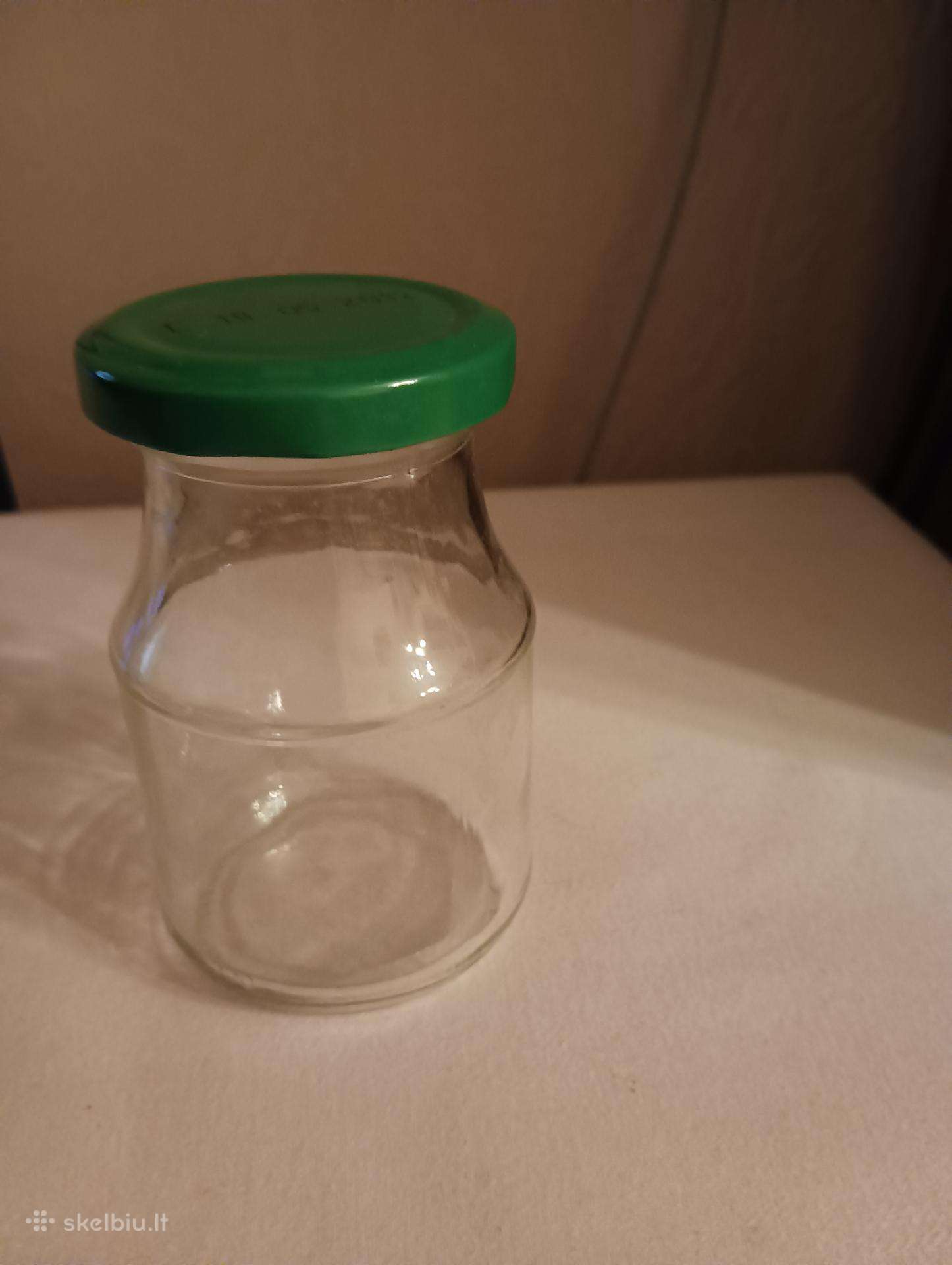 Tušti švarus užsukami stiklainiai su dangteliais