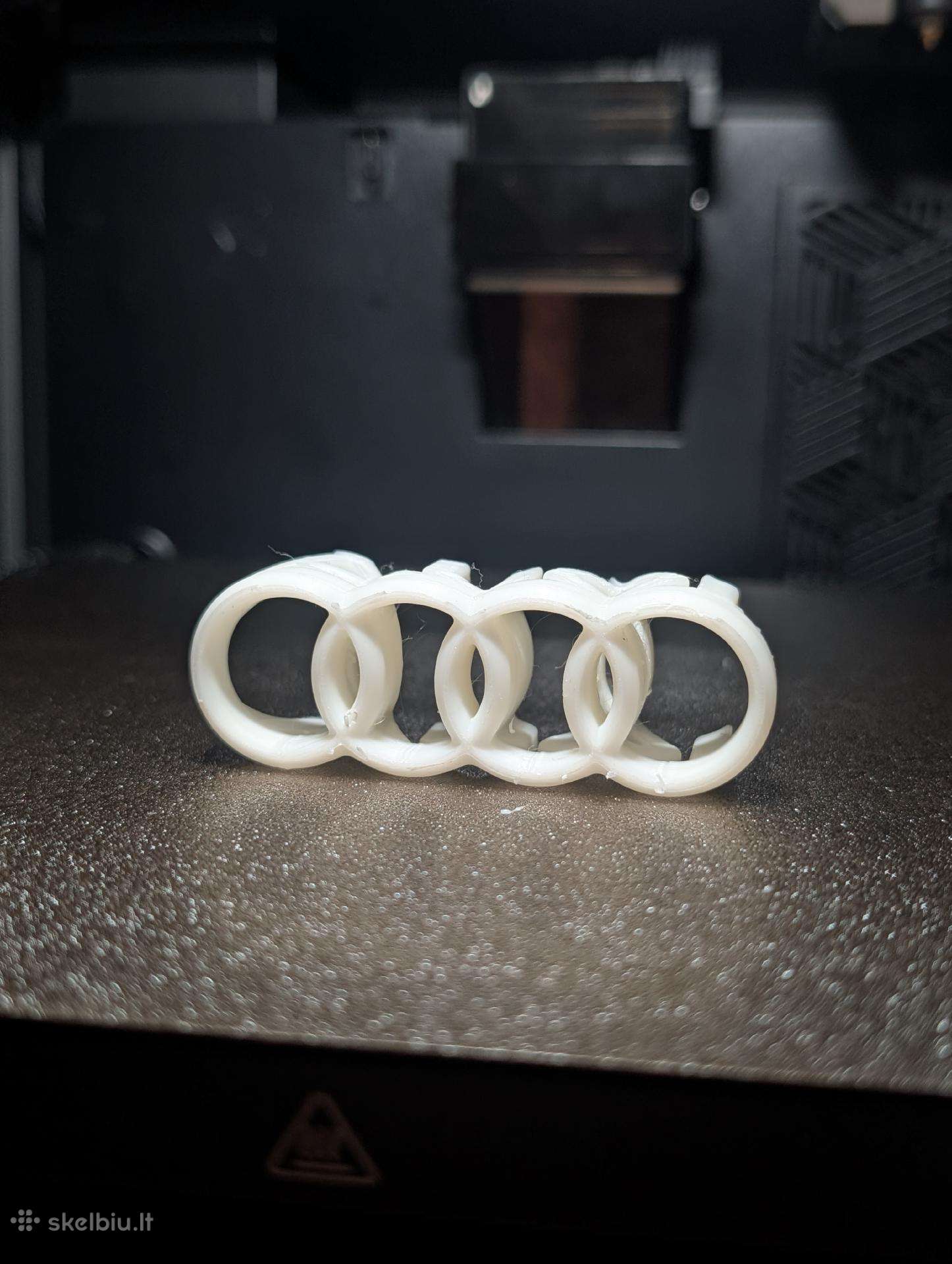 3D Audi ženkliukas/pavadinimas