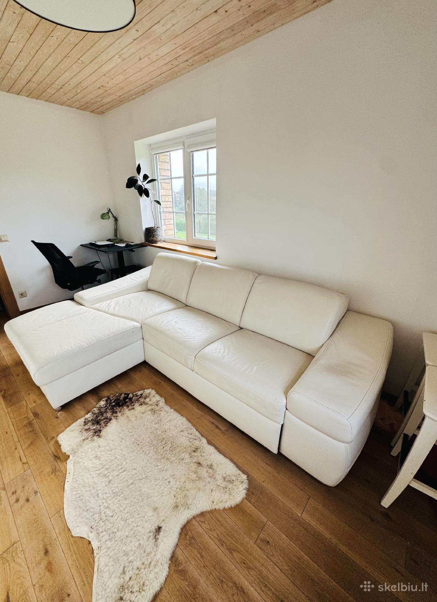 Odinė sofa-lova su patalynės dėže