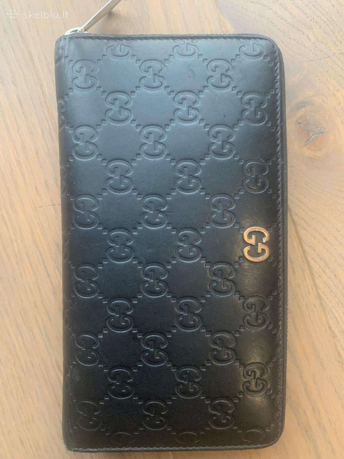 Gucci pinigine