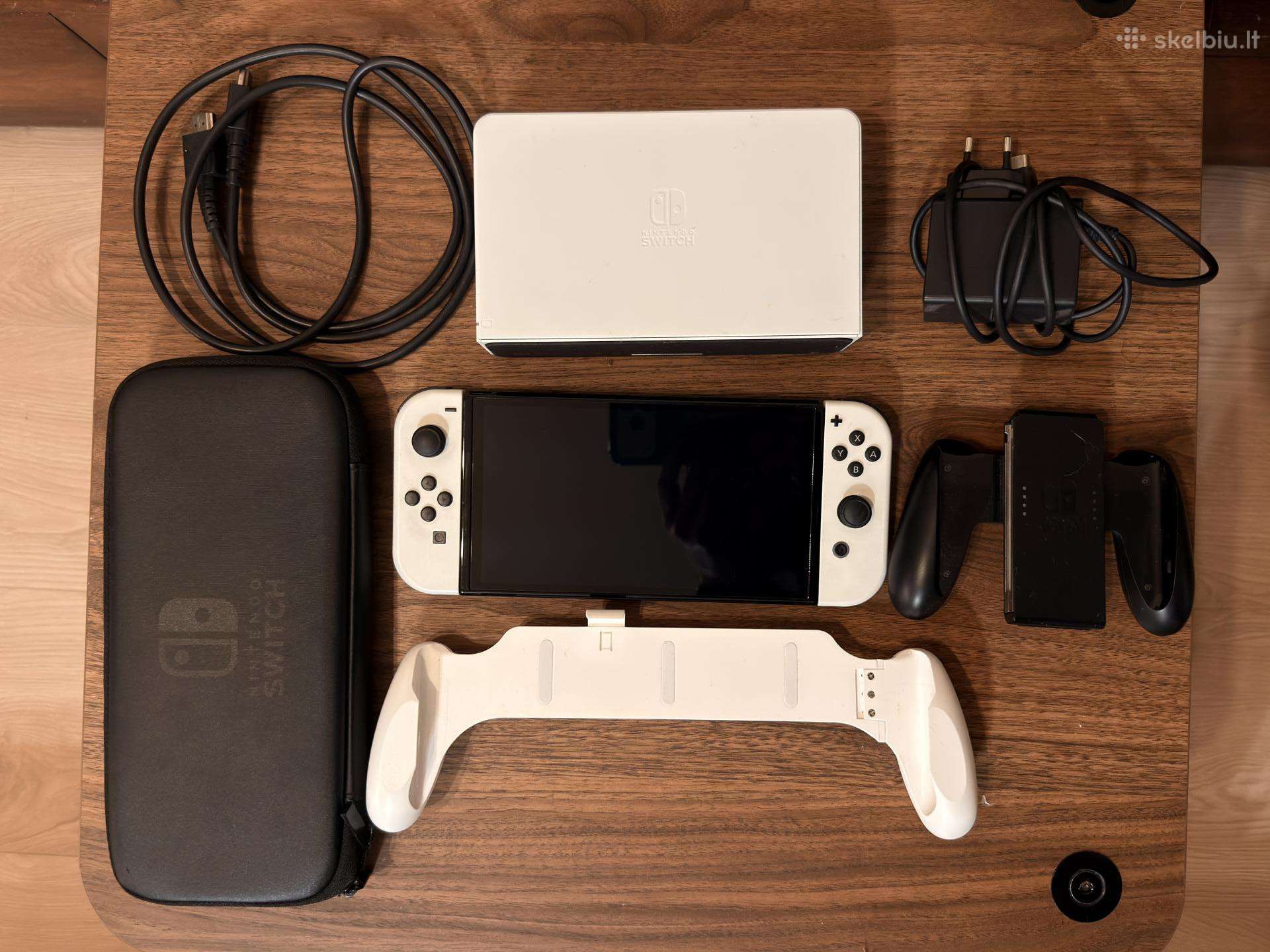 Nintendo Switch Oled + 64gb micro sd + Grip'as