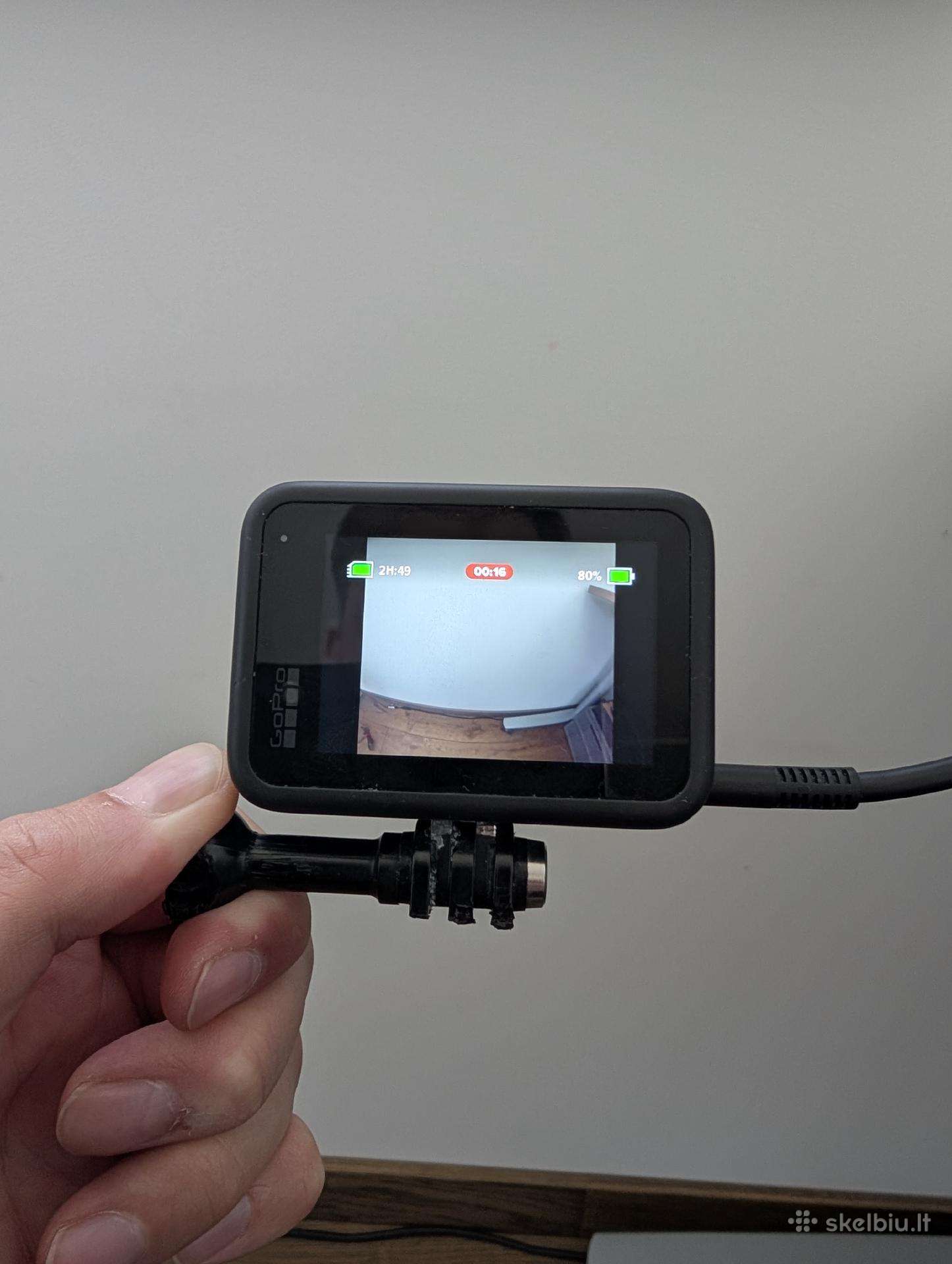 Gopro 13 black - su užstrigusiu laikikliu