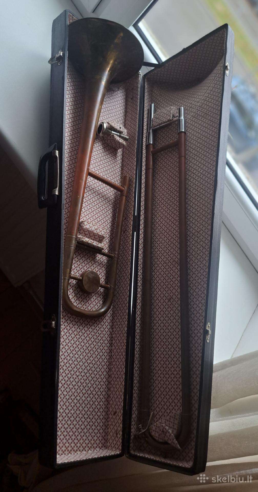 Kolekcinis retro trombonas su dėklu.