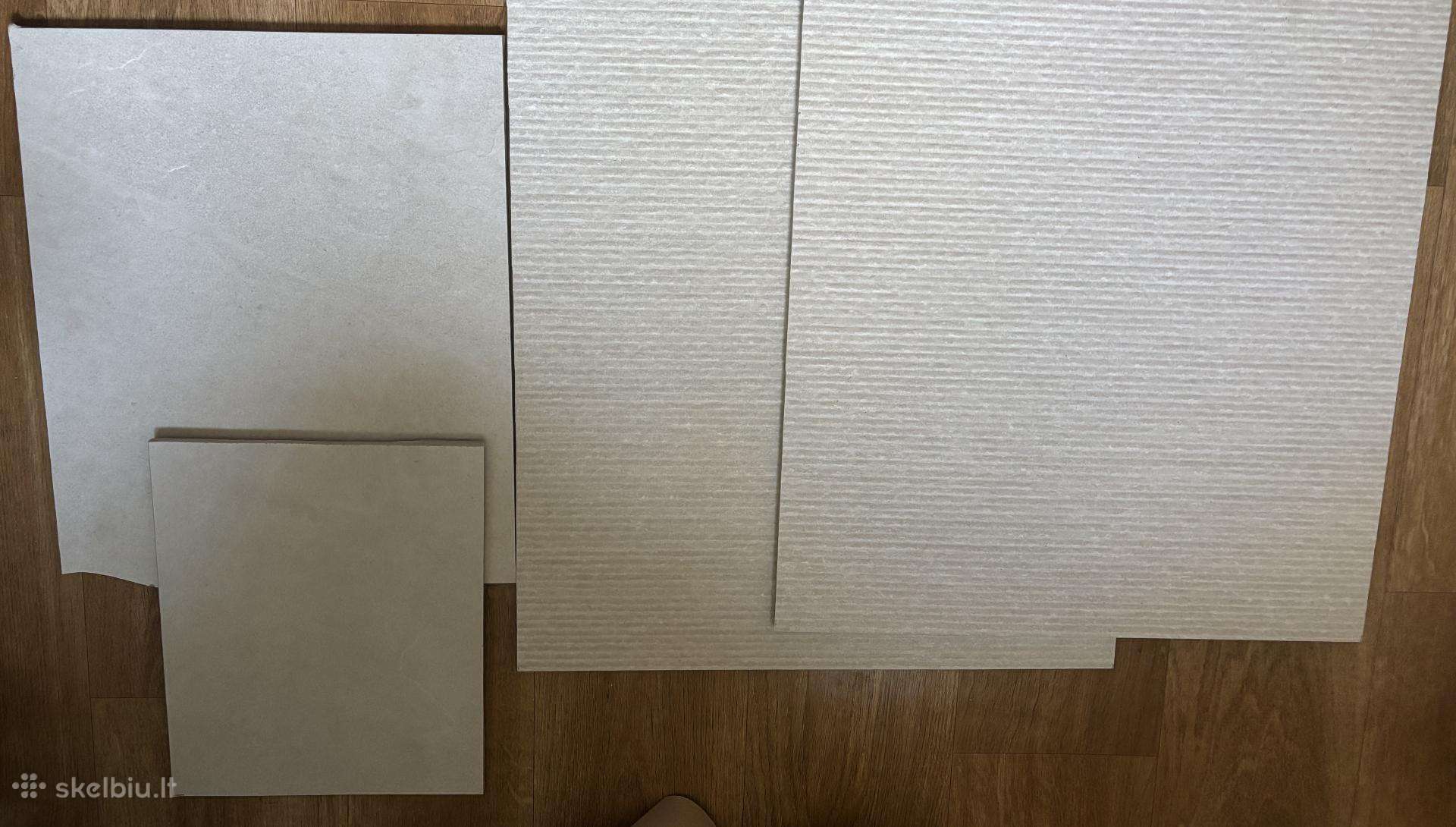 Dovanoju akmens masės plytelių likučius (atraižas)