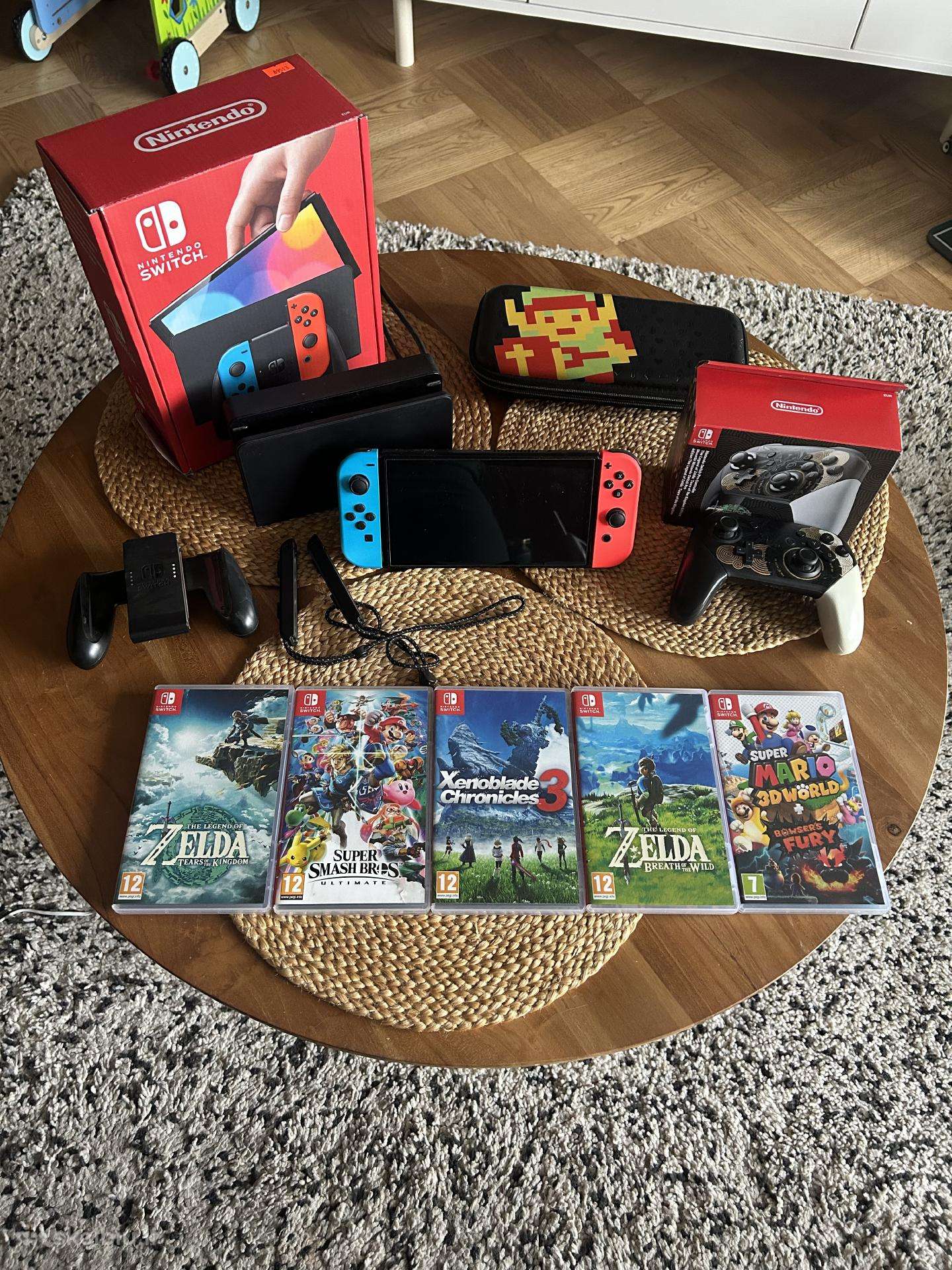 Nintendo Switch Oled + controller + zaidimai