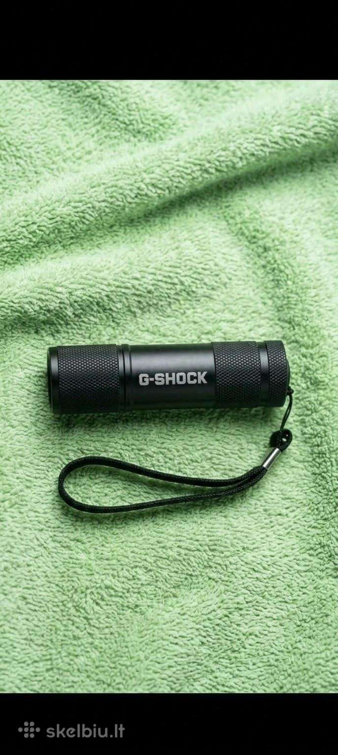 „g-shock“ Prožektorius - Žibintuvėlis