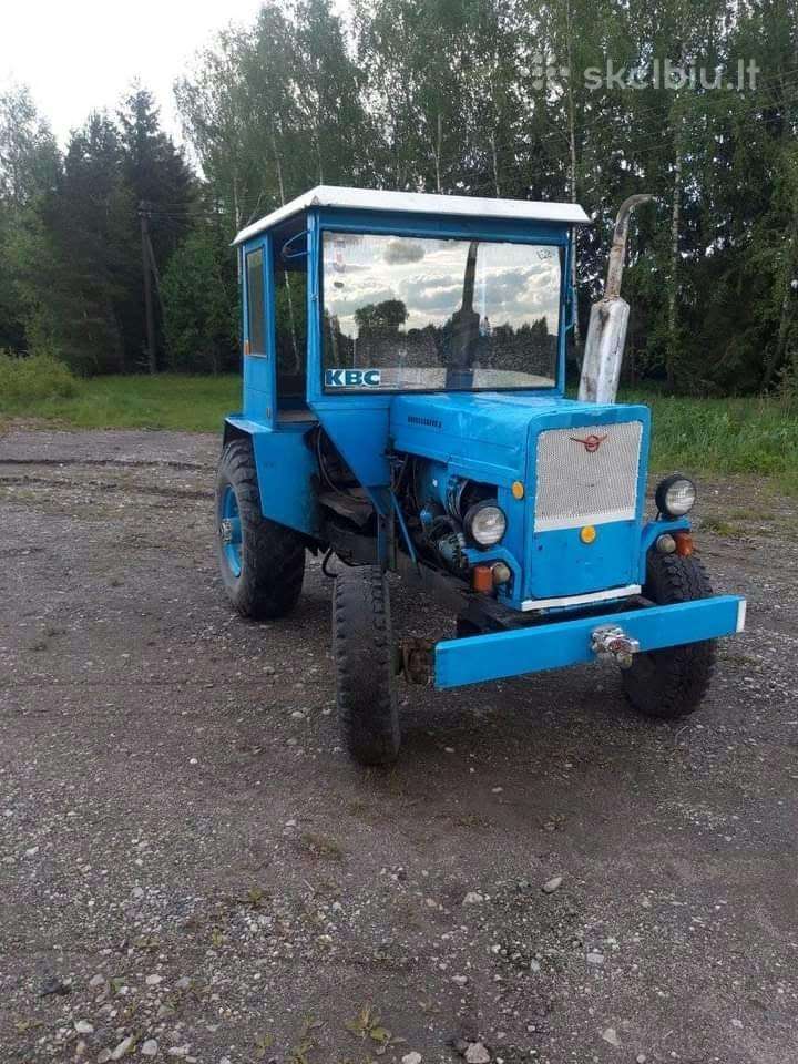 Parduodami 2 traktoriai ir plūgas