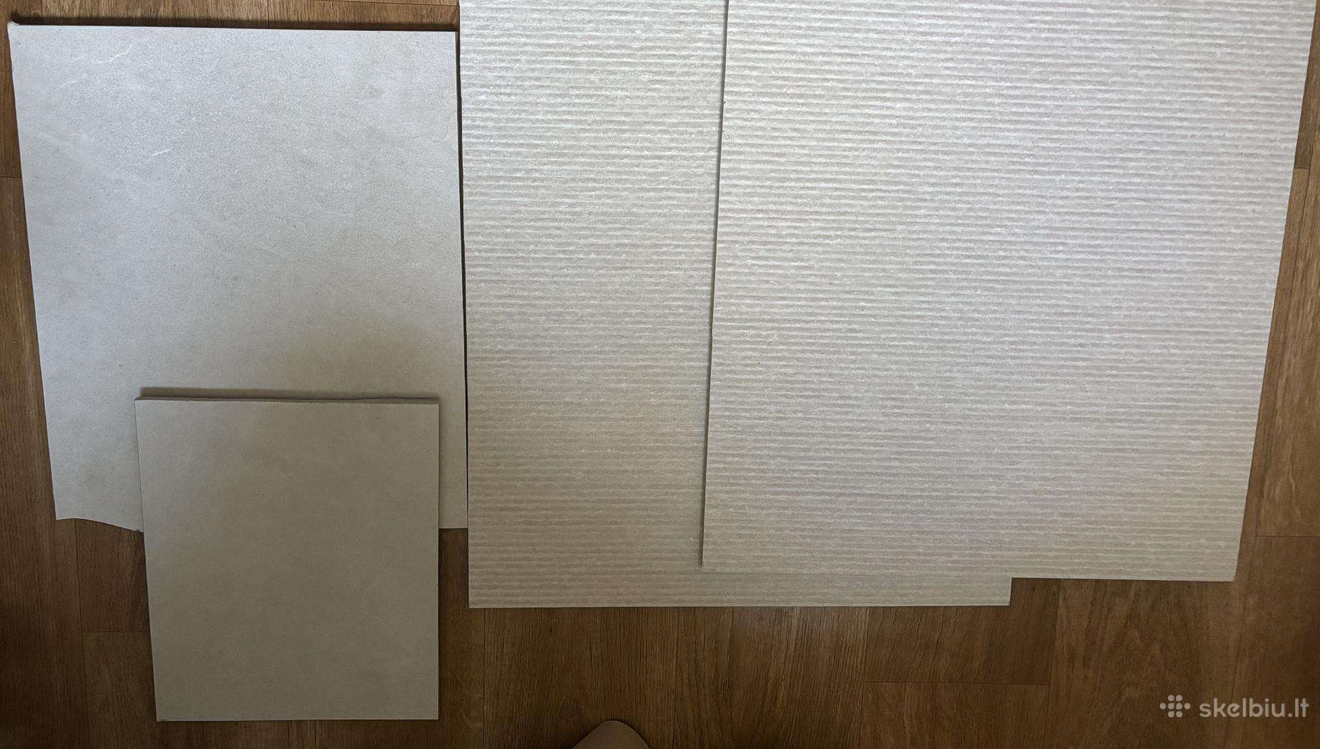 Dovanoju akmens masės plytelių likučius (atraižas)