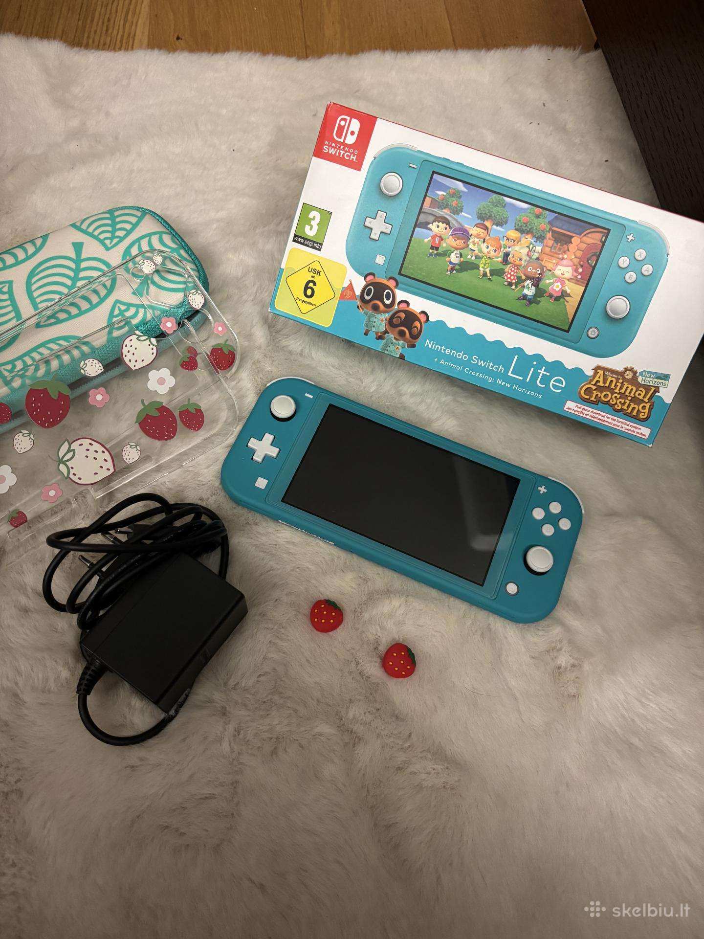 Nintendo Switch Lite (Turquoise) su priedais