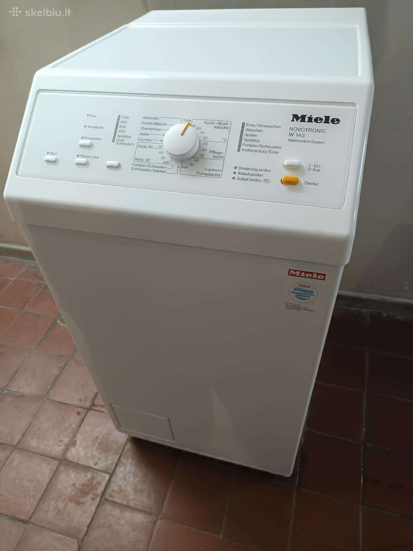 Miele 6 kg per viršų kraunama su garantija
