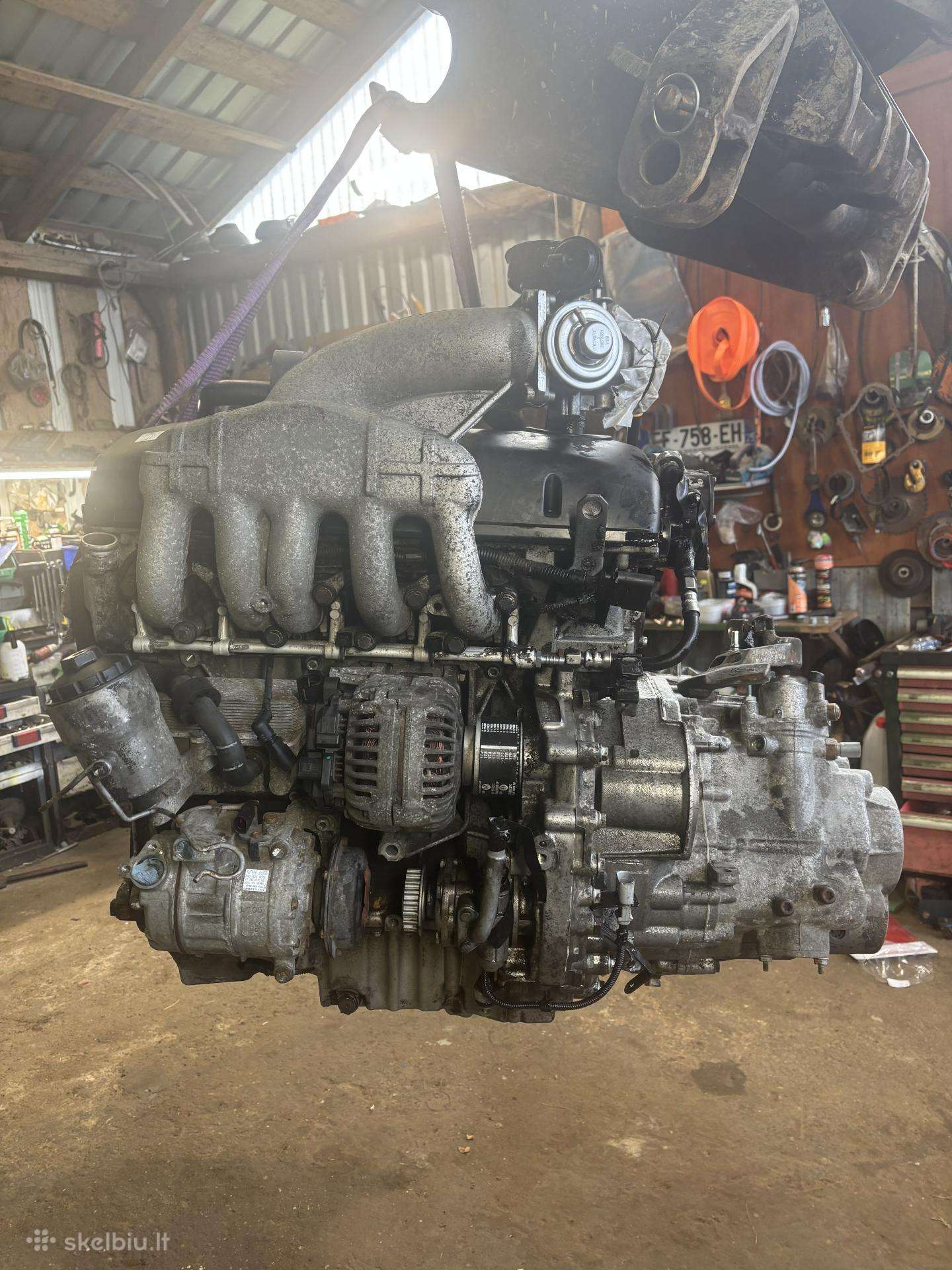 T5-96kw 2,5tdi kodas Axd .