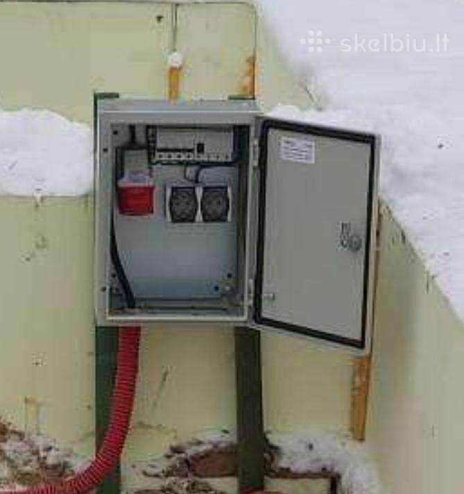 Perku lauko elektros skydinę.
