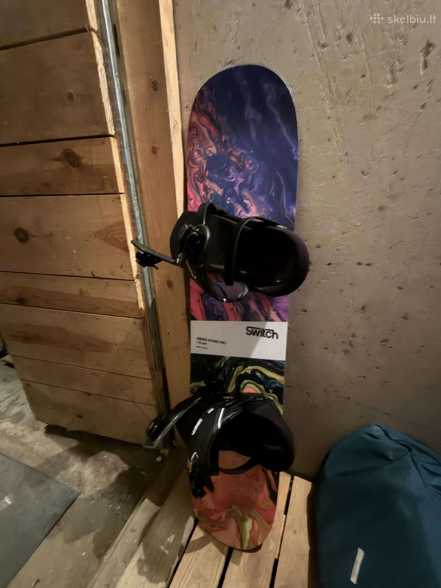 Switch Jibbing Snowboard