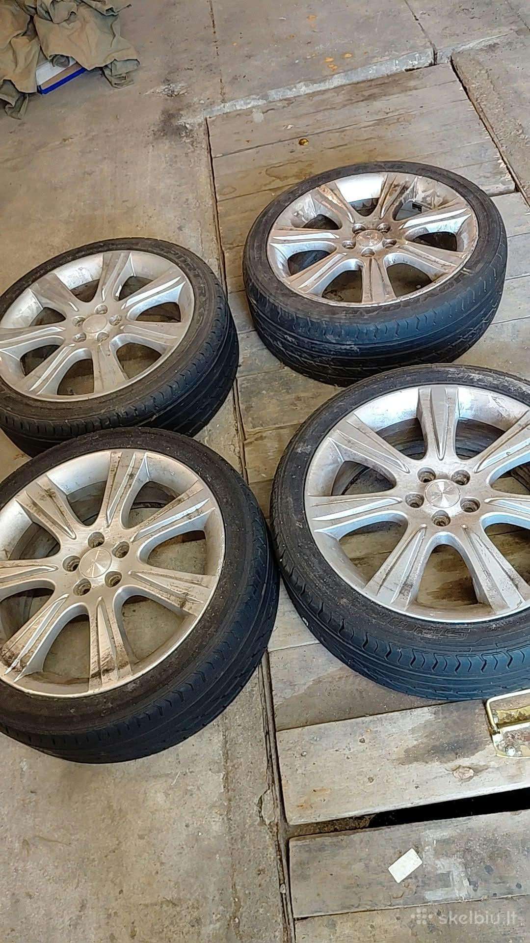 Originalūs Subaru R18 ratlankiai.