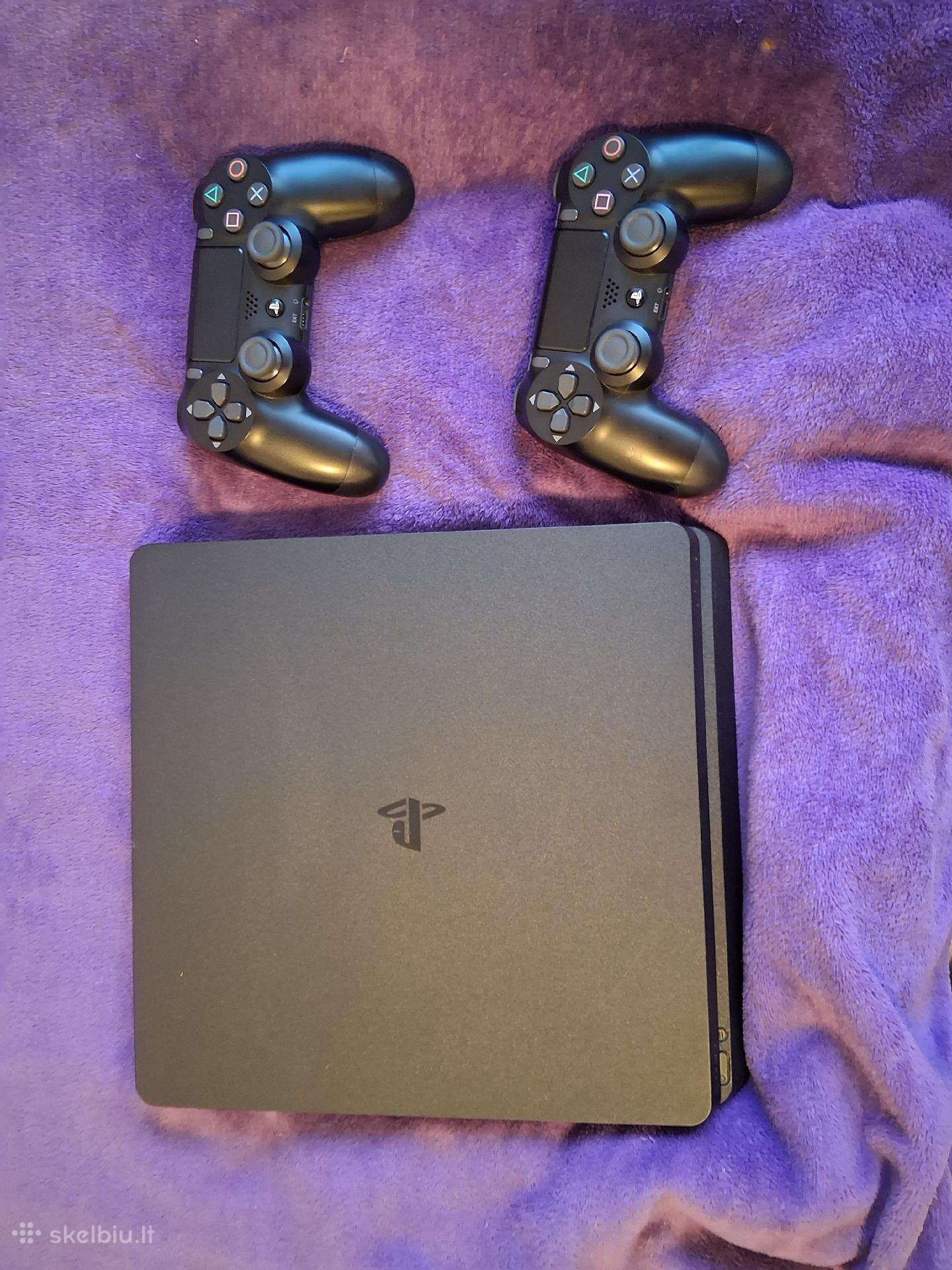 Playstation 4 slim su 7 žaidimais