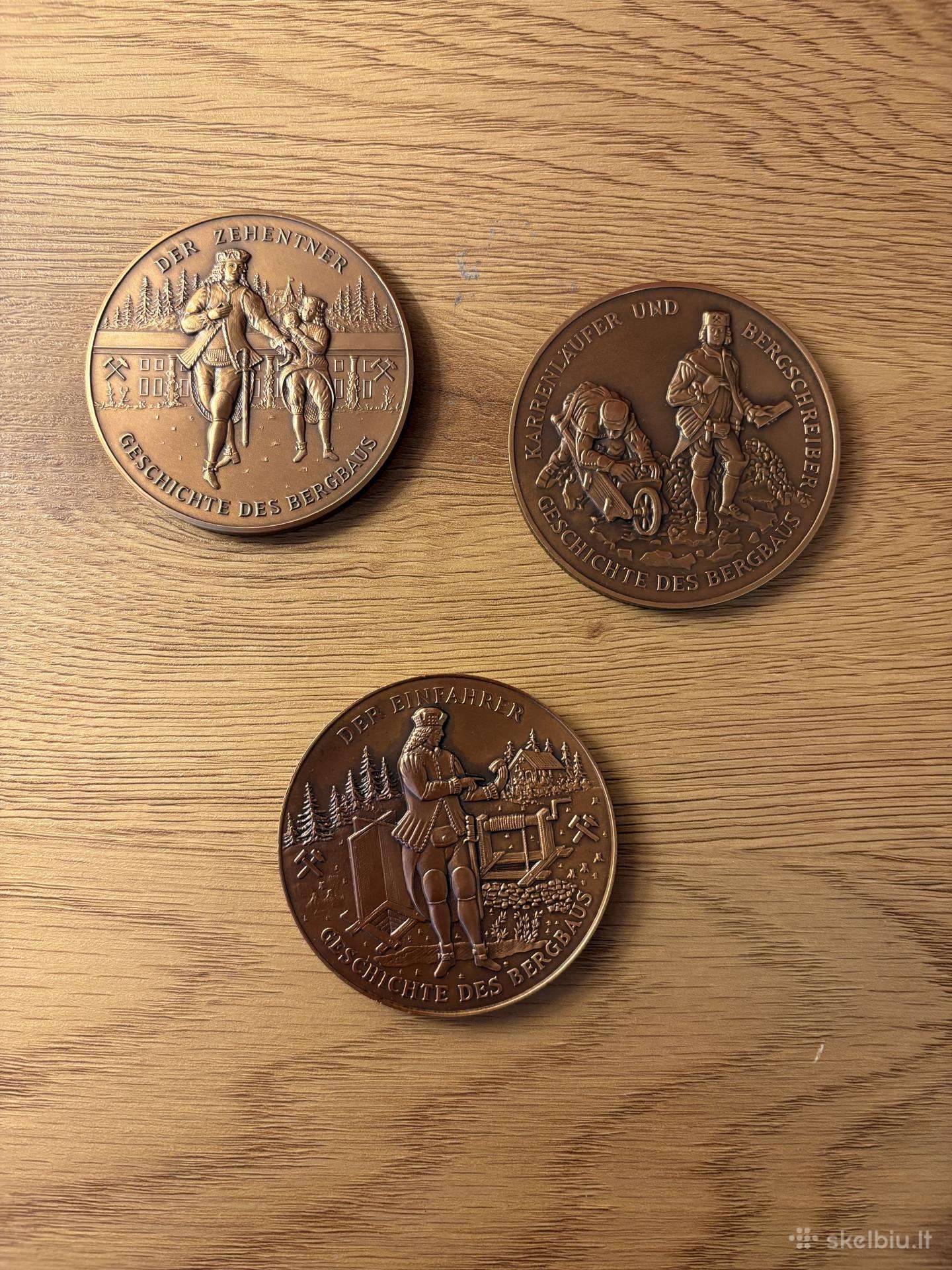 Vokiškų medalių rinkinys skirtas kalnakasybai