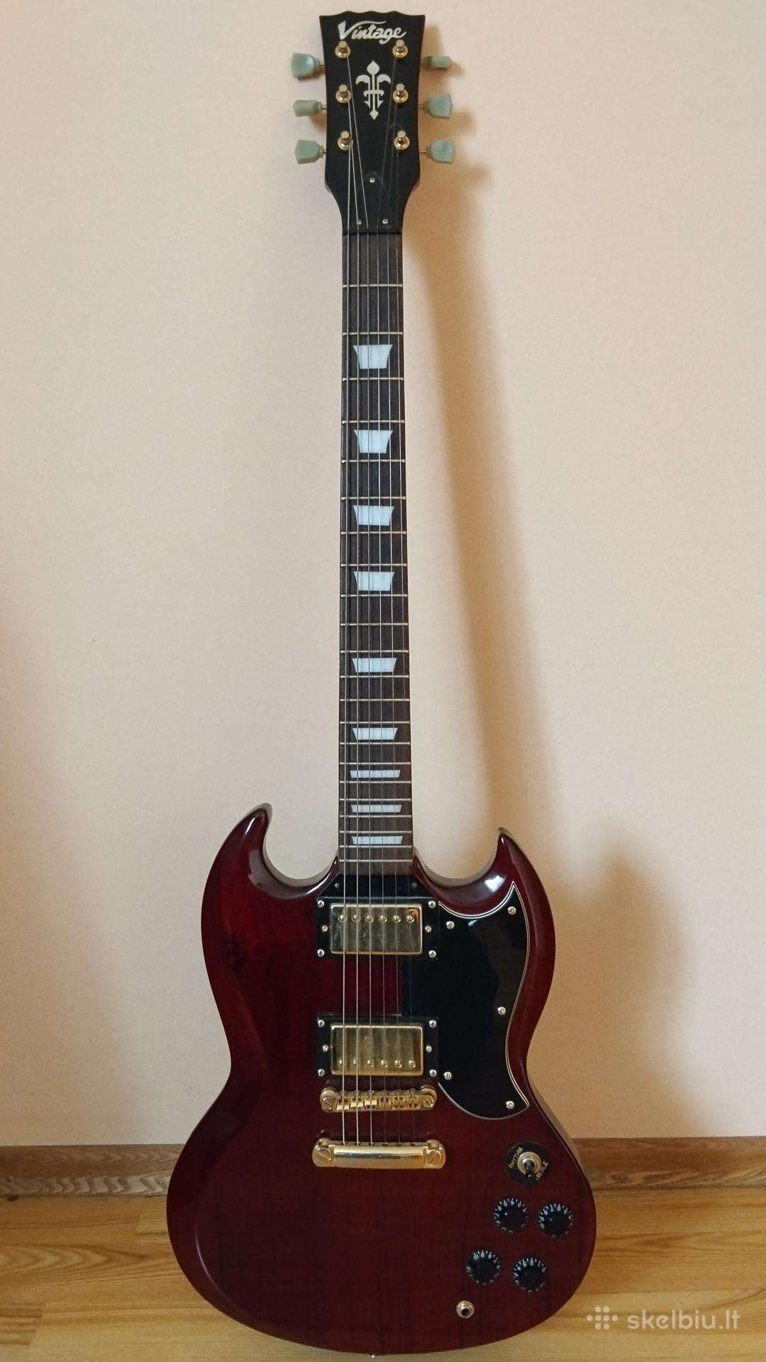 Elektrinė gitara su stiprintuvu