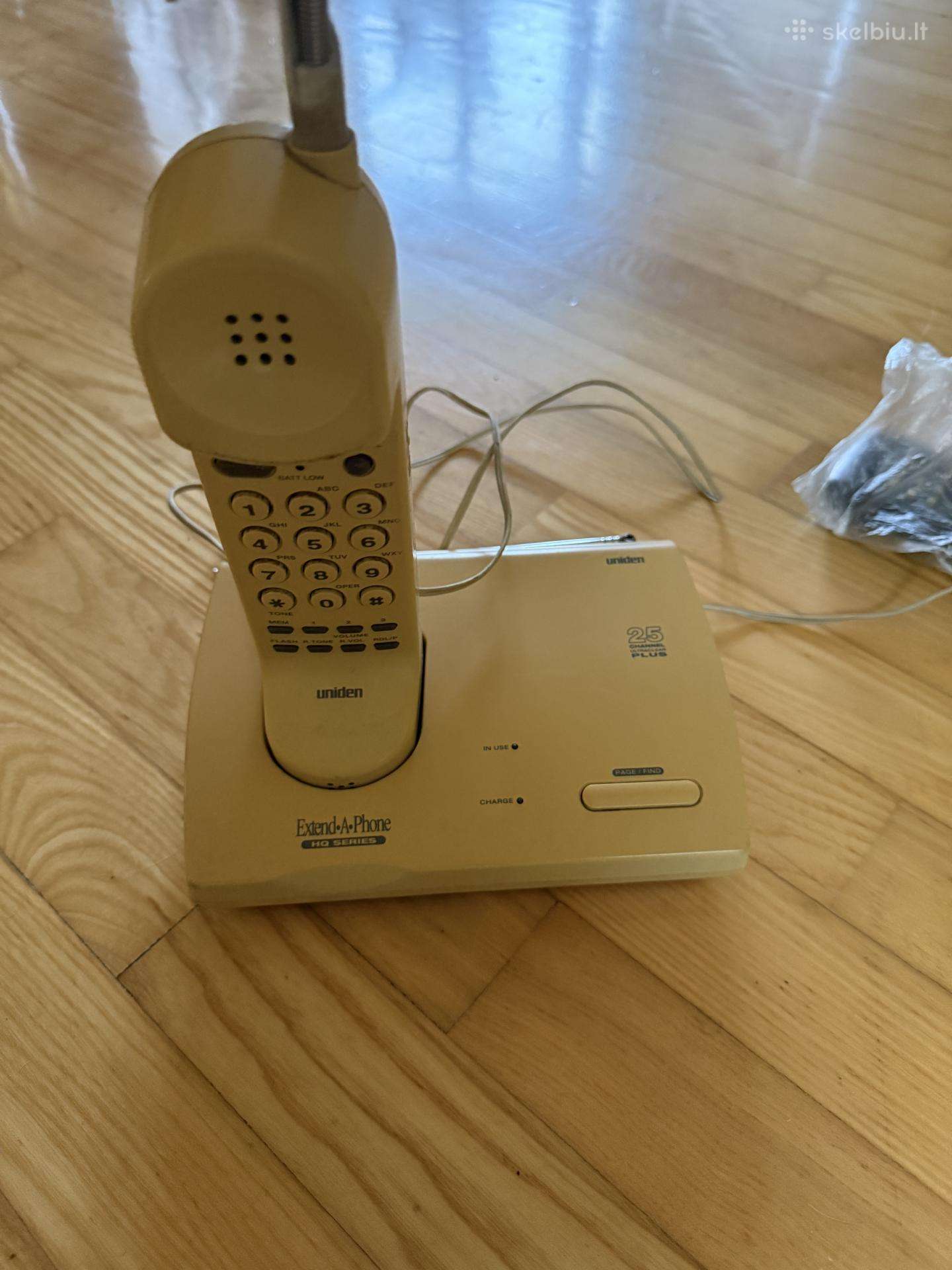 Tel. Uniden Extend-a-phone su Pti St-100 įtampos k