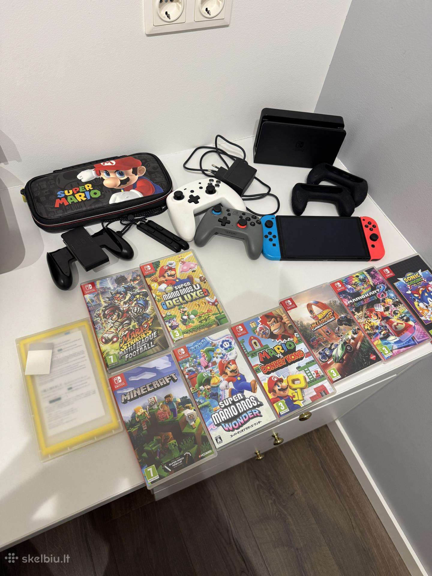 Nintendo Switch V2 komplektas + 8 žaidimai