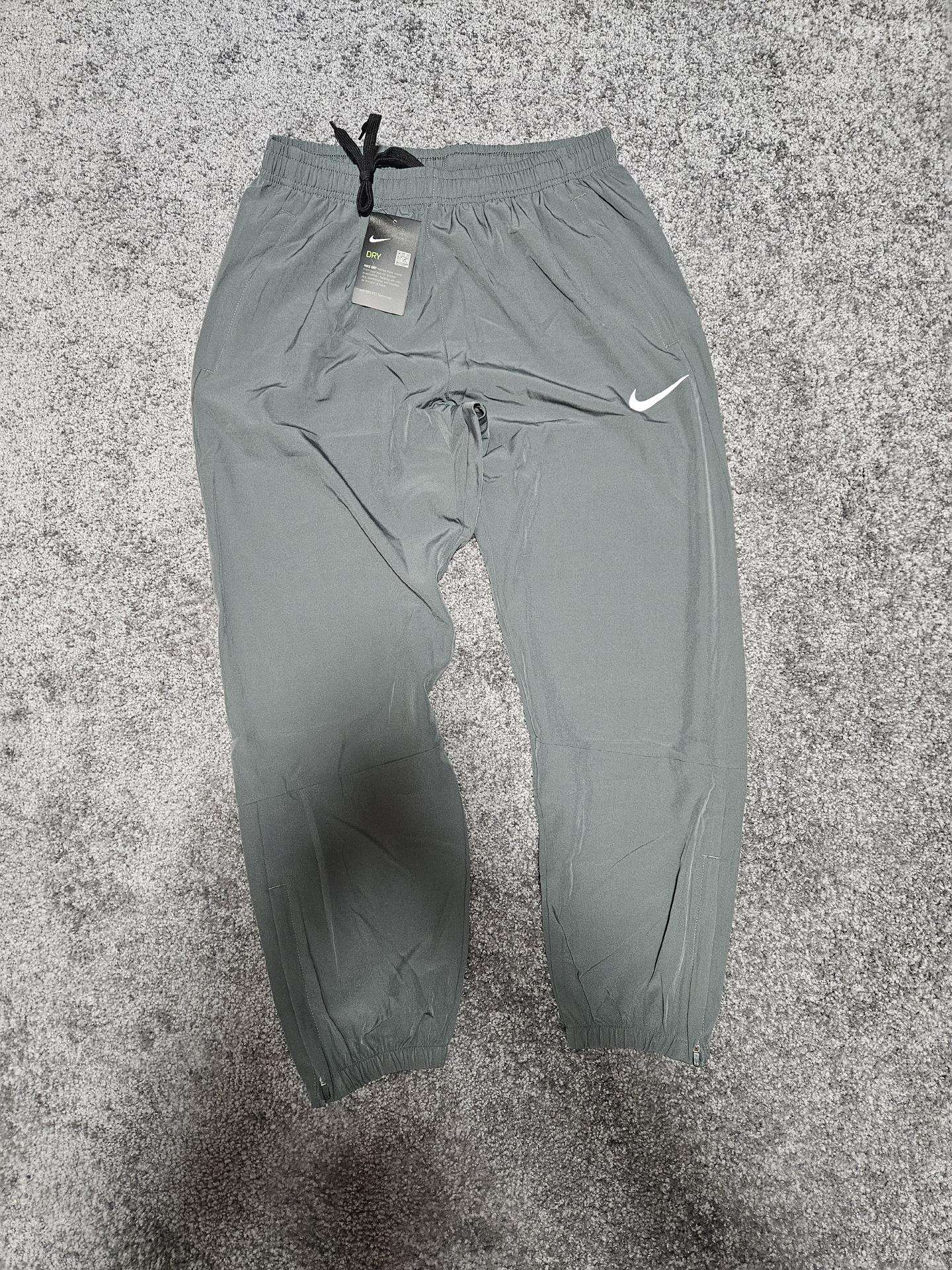 Nike Dri-fit lengvos sportinės kelnės, L