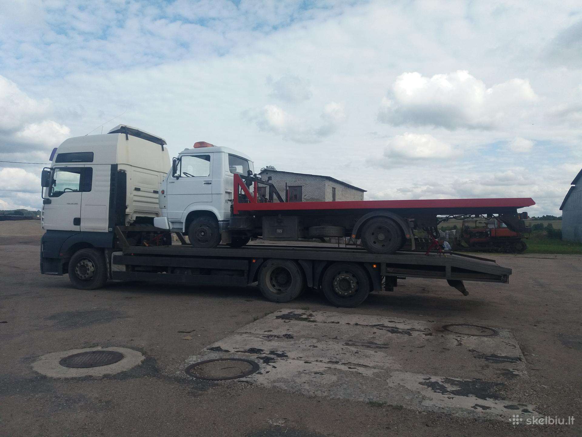 Tralas Vilniuje, statybines tech. transportavimas